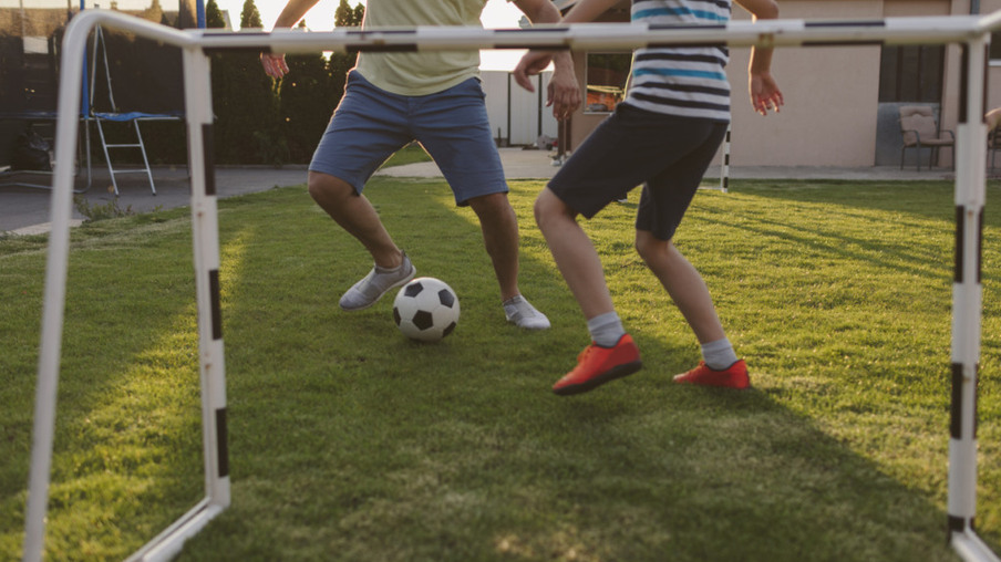 Family Playing Soccer